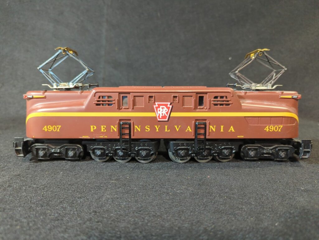 Las Vegas Train World - Train of the Day - Rail King MTH PPR GG-1 3-Rail #4907 Tuscan Stripe Electric Engine